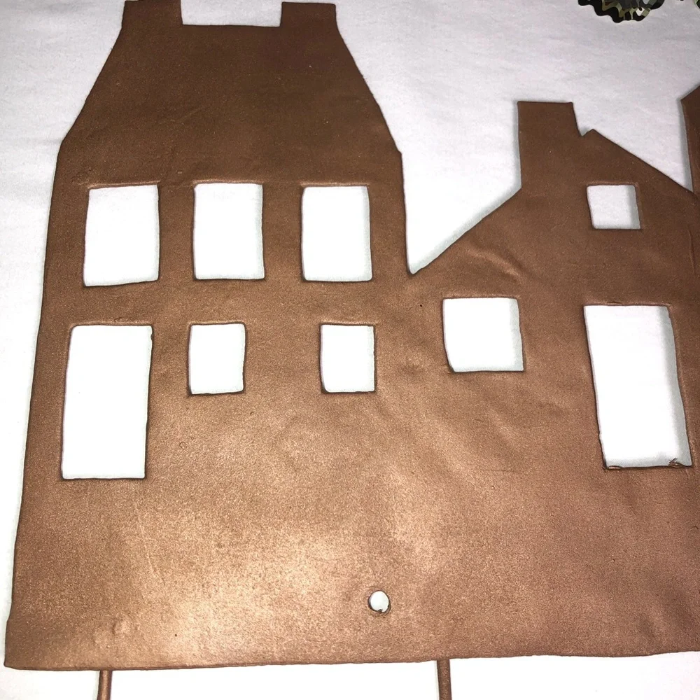 Copper painted metal house wall hanger with hooks, pre-owned